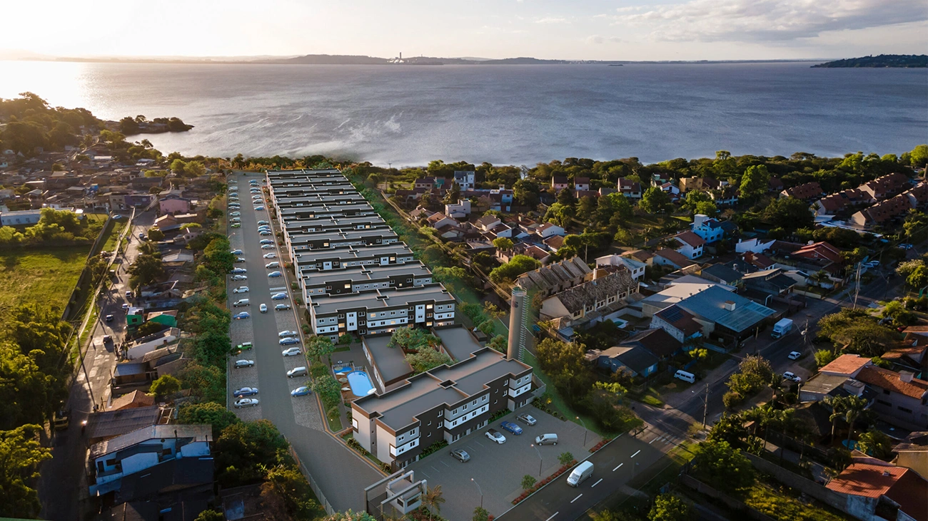 Perspectiva oficial do BemViver Guarujá com luz de pôr do sol